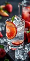 Refreshing strawberry beverage with ice and mint enjoyed on a summer day photo