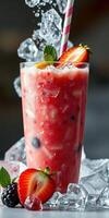 Refreshing berry smoothie garnished with fresh strawberries and mint served in a tall glass with ice photo