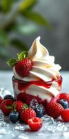 Delicious dessert featuring whipped cream, strawberries, and blueberries in a glass bowl on a table photo
