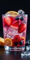 Refreshing fruit cocktail with ice and vibrant berries captured in close-up detail photo