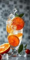 Refreshing citrus drink with ice and fresh oranges presented on a stylish table photo