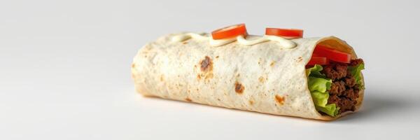 Delicious beef burrito with fresh lettuce and tomato slices served on a plain background photo