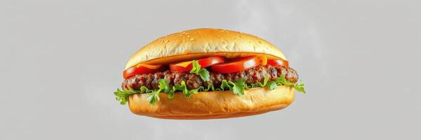 Delicious burger featuring fresh lettuce, tomatoes, and savory beef patty on a soft sesame seed bun photo