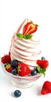 Creamy berry swirl dessert topped with fresh strawberries and mint leaves on a white background photo