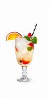 Refreshing fruit cocktail served in a decorative glass with citrus and mint garnishes photo