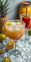 Colorful cocktails with fresh fruits on ice in a summer setting near tropical decorations photo