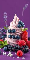 Creamy soft serve topped with fresh berries arranged on a vibrant purple background photo