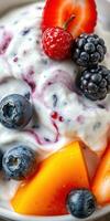 Fresh yogurt topped with assorted berries and fruits showcasing vibrant colors and textures photo