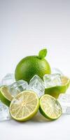 Fresh limes arranged with ice cubes creating a refreshing summertime vibe photo