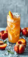 Refreshing peach iced drink garnished with fresh fruit on a cool background photo