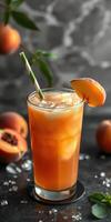 Refreshing peach iced tea served in a tall glass with ice and garnished with a slice of peach photo