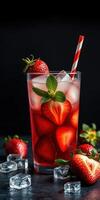 Refreshing strawberry drink with ice and mint leaves served in a clear glass photo