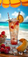 Refreshing tropical beverage featuring fruits on a sunny beach with ocean background photo