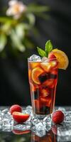 Refreshing iced beverage garnished with citrus fruits and berries on a decorative table photo