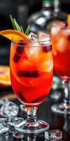 Vibrant summer cocktail served in a glass with fresh fruit garnishes at a lively bar during evening hours photo