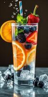 Refreshing fruit-infused beverage garnished with berries and citrus slices in a tall glass with ice photo