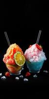 Colorful snow cones in glass bowls with fresh fruit on a black background photo