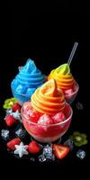 Colorful frozen treats in bowls served with ice and fresh fruit on black background photo