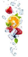 Fresh fruits and ice cubes create a refreshing summer drink mix with strawberries, orange, and mint leaves photo