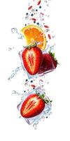 Fresh strawberries and oranges splash through ice cubes with droplets of water in a vibrant arrangement photo