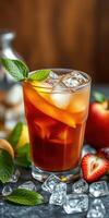 Refreshing iced tea with fresh fruits and mint served on a rustic table photo
