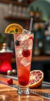 Refreshing summer cocktail with fruits and ice served in a bar photo