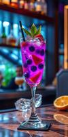 Refreshing purple cocktail with berries and citrus garnished at a lively bar during the evening photo