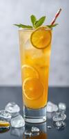 Refreshing summer cocktail with lemon slices and mint on a dark table photo