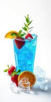 Refreshing blue drink garnished with strawberries and orange on a bright background photo
