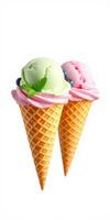 Two colorful ice cream cones with mint leaves and blueberries on a bright background photo