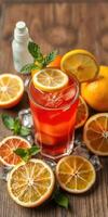 Refreshing citrus cocktail with vibrant fruit garnishes displayed on a wooden table photo