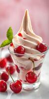 Cherry swirl dessert served in a glass cup with fresh cherries and mint on a light background photo