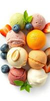 Colorful assortment of ice cream scoops and fresh fruits arranged on a white plate photo