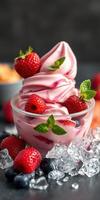 Delicious bowl of creamy strawberry dessert topped with fresh berries and mint leaves garnished with ice photo