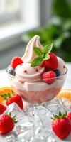 Delicious dessert with soft serve ice cream, fresh strawberries, and mint on a bright table setting photo