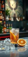 Refreshing drink with orange slices served over ice at a lively bar setting during evening hours photo