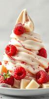 Delicious raspberry swirl soft serve ice cream topped with fresh berries and white chocolate pieces for a delightful dessert experience photo