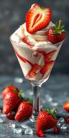 Strawberries and cream dessert served in a glass with fresh strawberries and syrup on a dark background photo