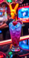 Colorful cocktail with ice and fruit garnish served at a vibrant bar during a lively night photo