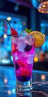 Refreshing purple cocktail garnished with fruits served in a vibrant bar setting at night photo