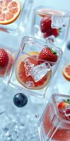 Refreshing fruit cocktails with ice cubes and vibrant berries against a light background photo