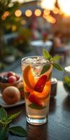 Refreshing summer cocktail with citrus and berries enjoyed on a sunny terrace in the evening photo