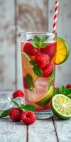 Refreshing raspberry lime beverage garnished with mint leaves on wooden table photo