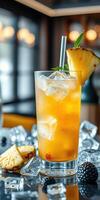 Refreshing tropical drink served in a tall glass with ice and fruit garnish during a sunny afternoon photo