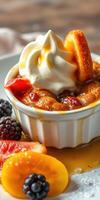 Decadent dessert served with fresh fruits, whipped cream, and caramel drizzle at a cozy cafe photo