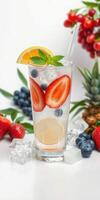 Refreshing fruit-infused drink with vibrant berries and citrus served with ice photo