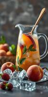 Refreshing fruit beverage with peaches and mint featuring ice and strawberries in a beautiful arrangement photo