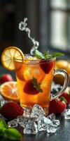 Refreshing iced tea with citrus and berries served in a glass on a dark surface surrounded by fresh fruit photo