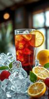 Refreshing iced tea with lemon and strawberries served over ice in a cozy cafe setting during the afternoon photo