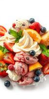 Colorful dessert platter with assorted ice cream, fresh fruits, and whipped cream served on a white background photo